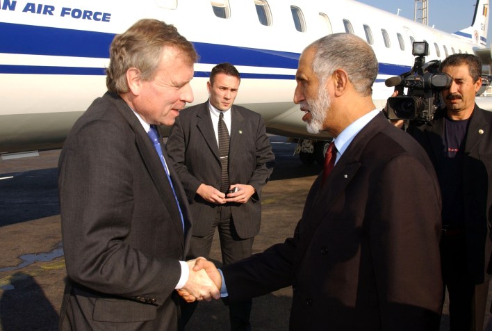 b041125a 25th November 2004 NATO Secretary general, Jaap de Hoop Scheffer visits Algeria Left to right: NATO Secretary General, Jaap de Hoop Scheffer is greeted by Algerian Minister of Foreign Affaris, Abdelaziz Belkhadem.